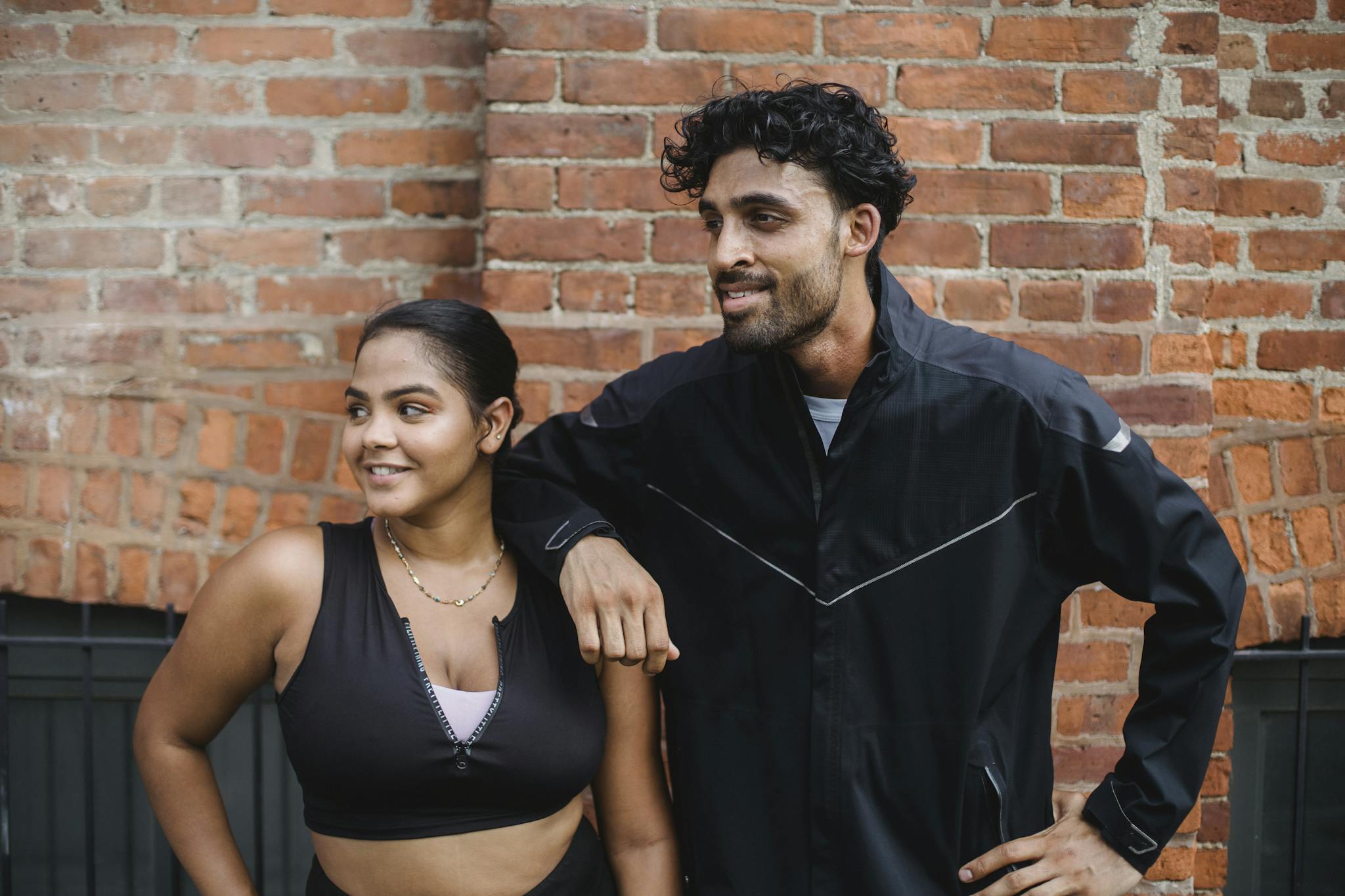 Man and Woman Taking Break in Exercise